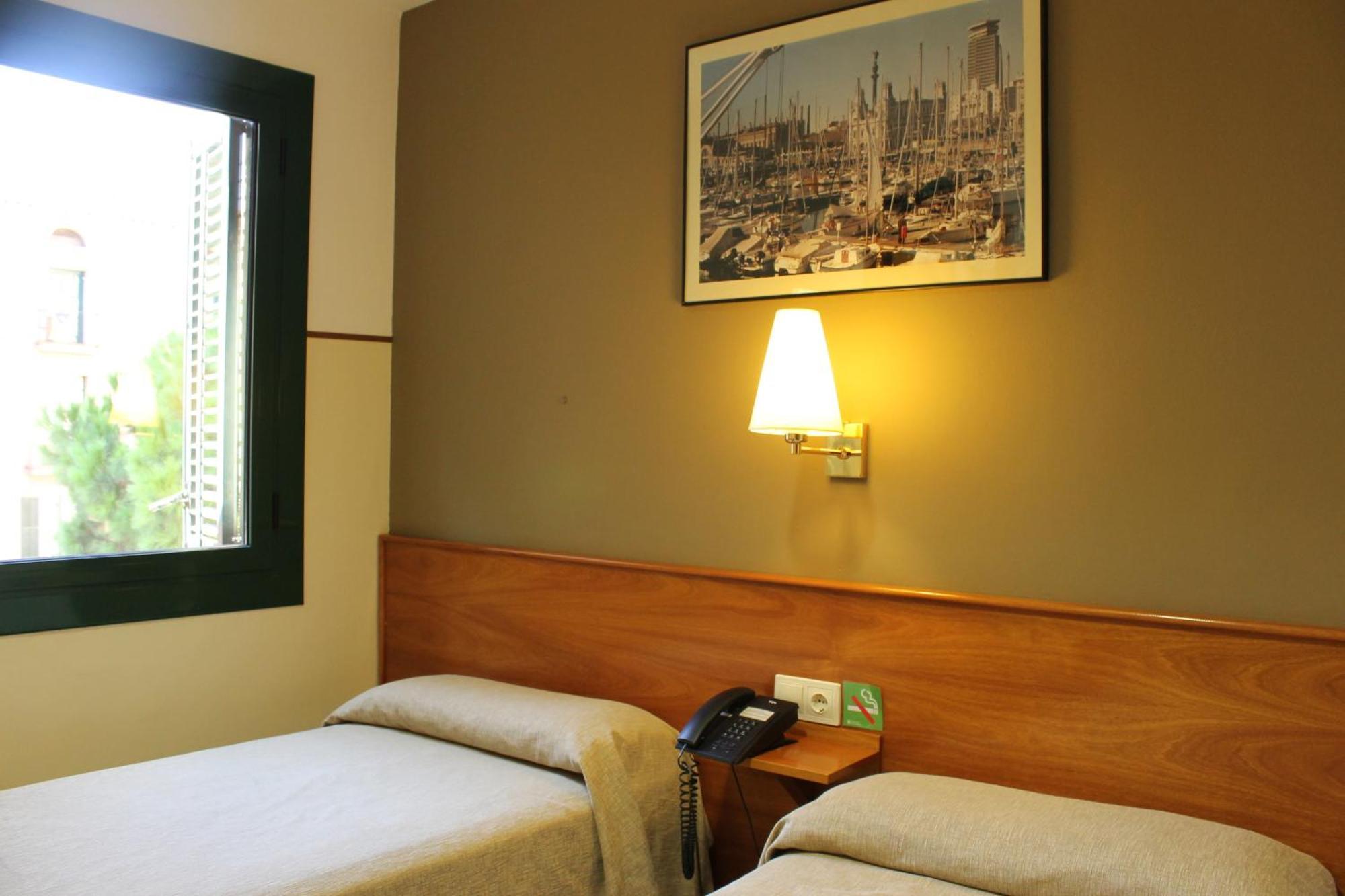 Hotel El Jardi Barcellona Camera foto